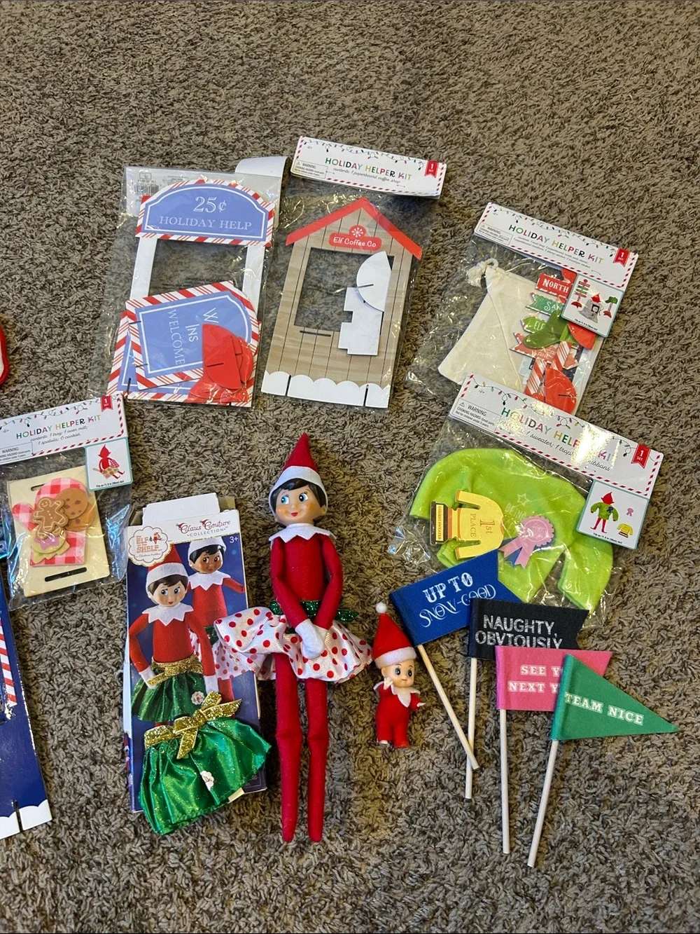 Elf on the shelf, elf figure, baby elf, and lots of props and accessories